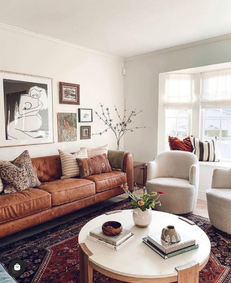 3seater German leather sofa, swivel chair, mahogany center table