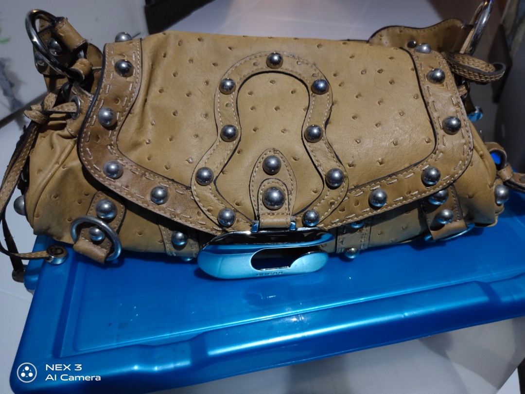 Guess purse. Ostrich leather. Normal wear on strap. Great condition