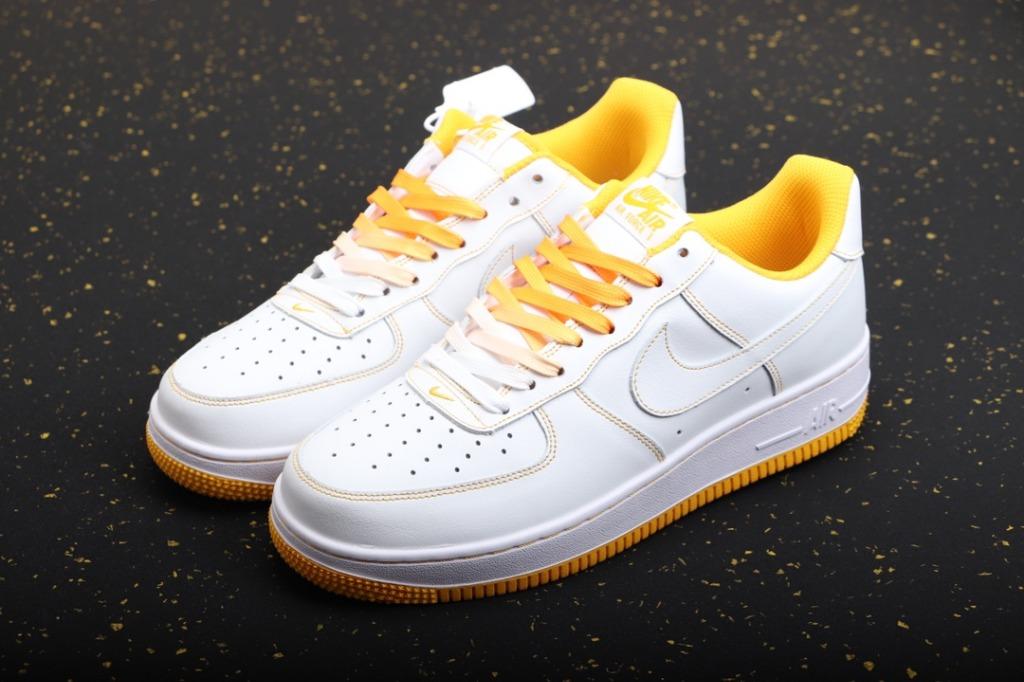 white yellow nikes