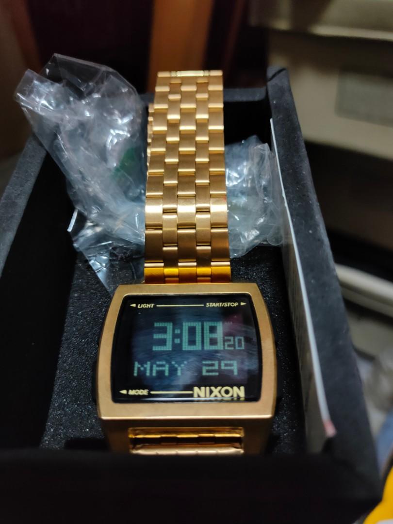 Nixon base on sale gold