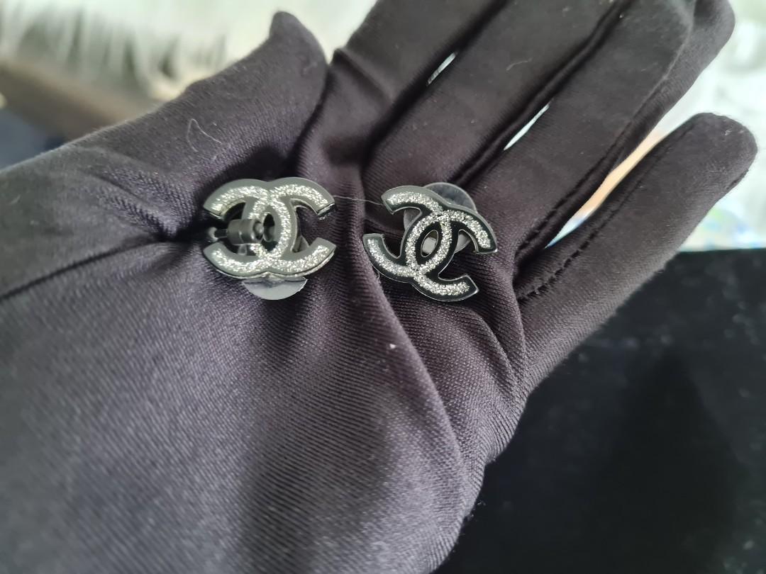 Chanel interlocking c earrings store