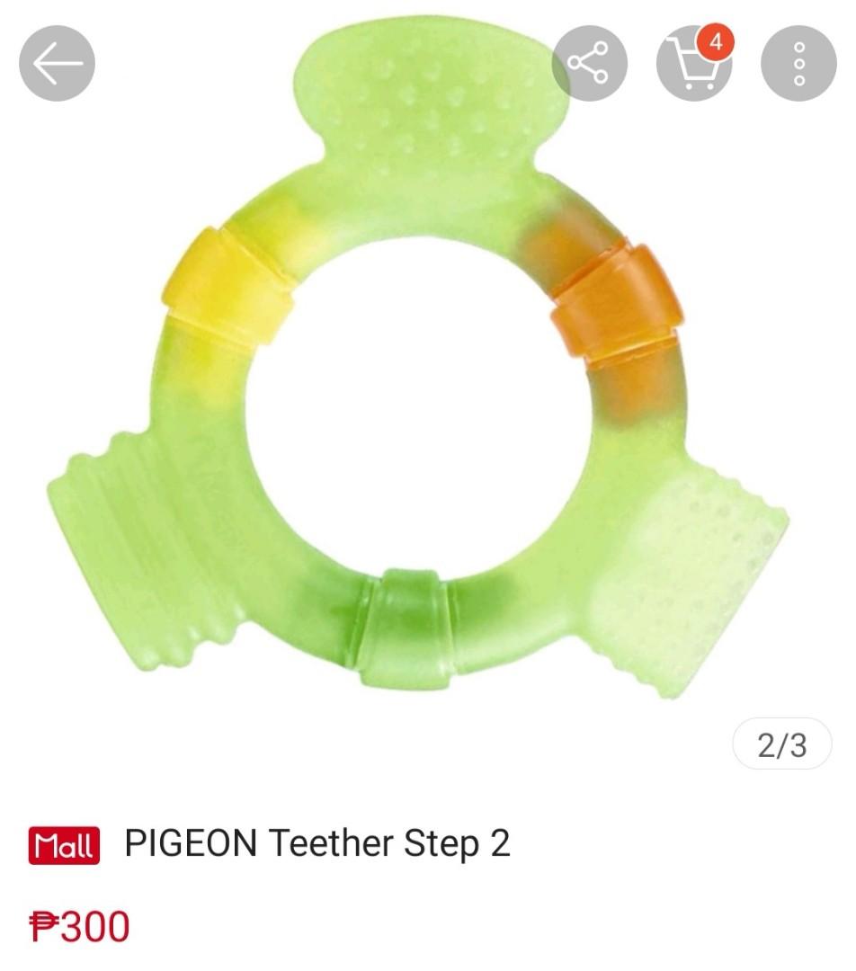 Pigeon Teether (Category: Soothers & Pacifiers) located in Pasig City. Submitted by cassidys_closet (Listing ID 1090719048, Image 3). Description: Teether Step 2 has soft handle and teething pad to prevent choking. It also has different shapes and thickness to bite and promote chewing and strong color scheme to attract baby. • Soft handle and teething pad to prevent choking • Different shapes and thickness to bite and promote chewing • Strong col