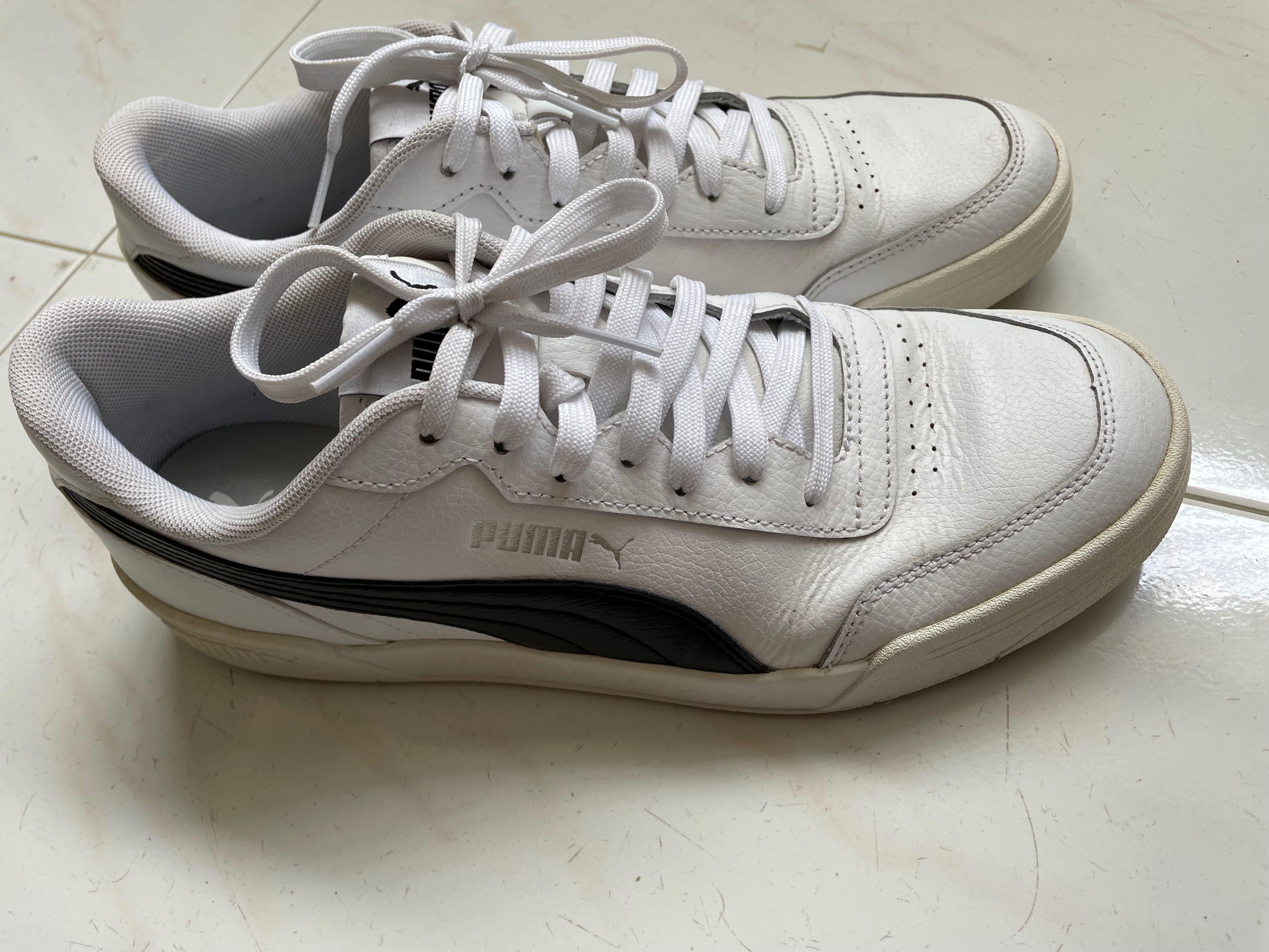 Puma white black best sale sneakers