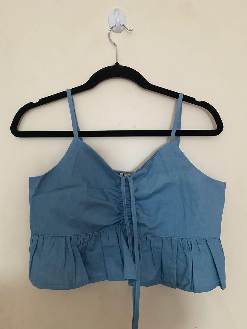 BNWT Bench Sleeveless Denim Blue top (Category: Sleeveless) located in Makati City. Submitted by rrd827 (Listing ID 1085401216, Image 1). Description: Bought right before lockdown out of impulse :( Can fit M-L.