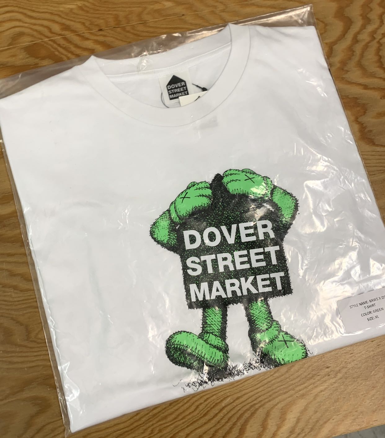 Kaws x DSM tee, Men's Fashion, Tops & Sets, Tshirts & Polo Shirts ...