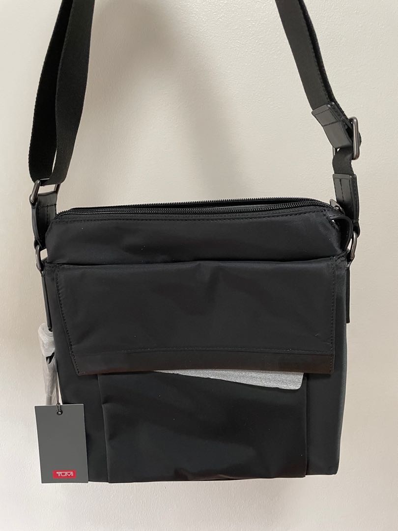 Tumi flap zip crossbody 2025