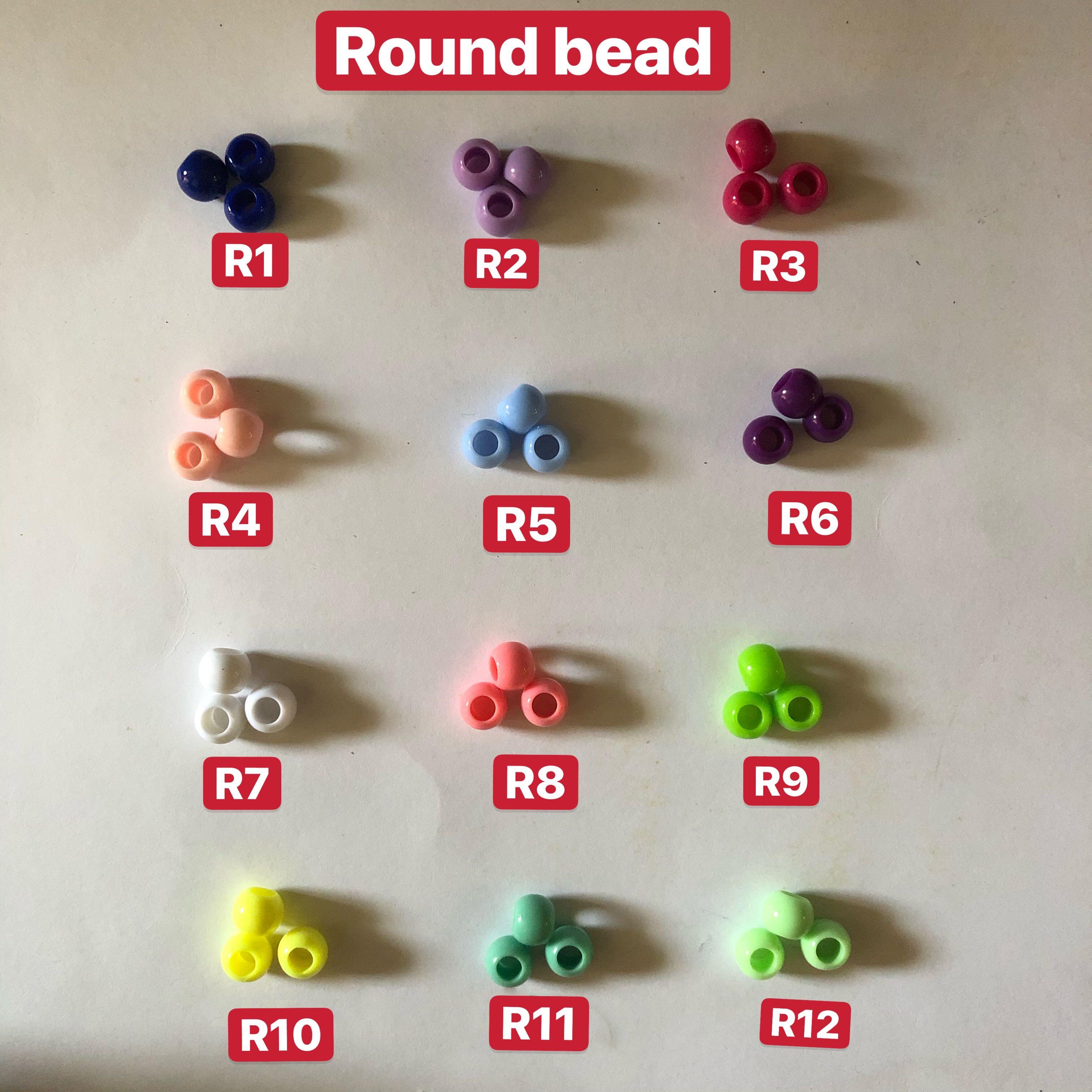 Customized keychains (Category: Craft Supplies & Tools) located in Singapore. Submitted by maylingcraft (Listing ID 1081901492, Image 4). Description: Pricing With normal charm $2.50 With premium charm $3.00 Kindly advice the following when placing your order 1. Star bead color choice 2. Round bead color choice 3. Name 4. Charm choice 5 Packaging choice Note : - random color will be given for alphabet beads - Maximum alphabet including spacing is