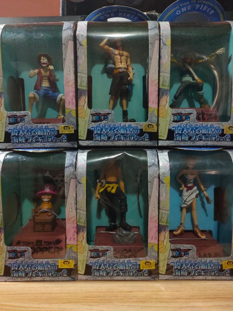 One Piece Banpresto Figures (Category: Figurines & Statues) located in Malabon City. Submitted by mirakaigemfinds (Listing ID 1090895553, Image 2). Description: One Piece Banpresto Great Route of Pirate Figures from Japan SOLD AS SET MISB, never opened but there are some dents on some boxes due to storage. Chopper Nami Luffy Zoro Ace Usopp Message for more photos.