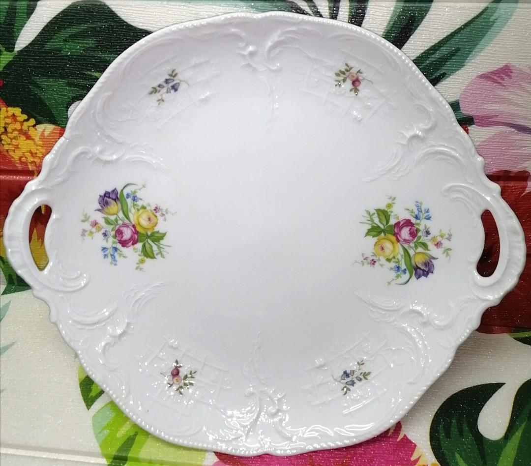 ROSENTHAL HANDLED PLATTER (Category: Dinnerware & Cutlery) located in Manila. Submitted by rarefindsgallery (Listing ID 1090881634, Image 1). Description: 📌 Brand New 📌 ROSENTHAL CLASSIC ROSE COLLECTION 🌸ELEGANT PORCELAIN HANDLED PLATTER Size : H: 1.75" / D: 12" x 11" *embossed design *with box 📍Manage your expectation : with manufacturing flaw but still so gorgeous, pls swipe pics Germany 🇩🇪 💸 Php1,399 na lang *price nito is 2k up talaga 