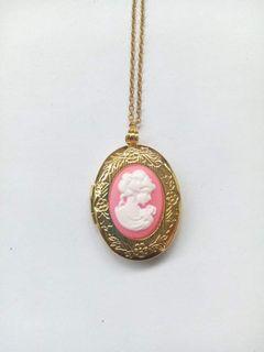 For Sale I have this  Victorian Pink and white Cameo Lady Photo Locket Jewelry Necklace   #cameo #necklace #jewelry #locket  Beautiful 18mm by 13mm resin cameo  Opens up for Photo, picture or keepsake   18" Stainless Chain  Decorative gold plated frame