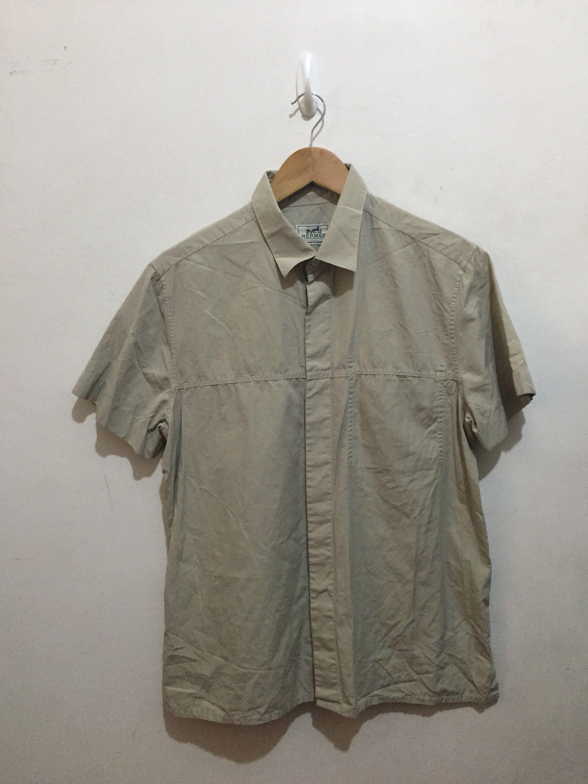 Hermes vintage shirt (Category: Luxury Apparel) located in Quezon City. Submitted by mcenon35 (Listing ID 1091168505, Image 1). Description: Vintage buttondown shirt will fit medium shoulder 18” armpit 21.5” lenght 28” with side slit color beige very good condition pa po.