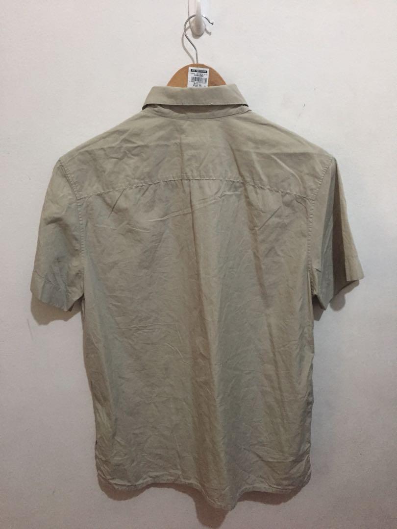 Hermes vintage shirt (Category: Luxury Apparel) located in Quezon City. Submitted by mcenon35 (Listing ID 1091168505, Image 2). Description: Vintage buttondown shirt will fit medium shoulder 18” armpit 21.5” lenght 28” with side slit color beige very good condition pa po.