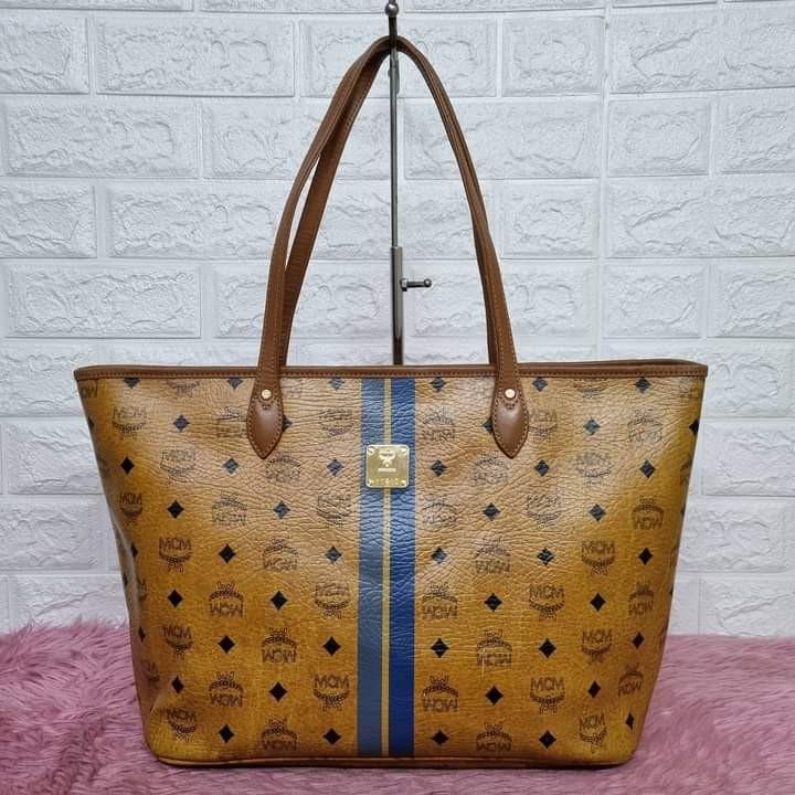 Mcm cognac bucket bag, Luxury, Bags & Wallets on Carousell