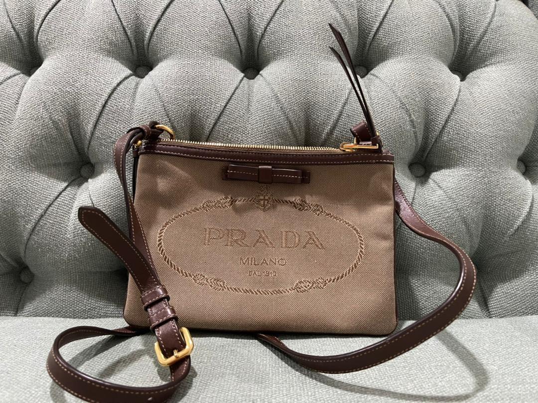 Authentic Prada canvas sling bag