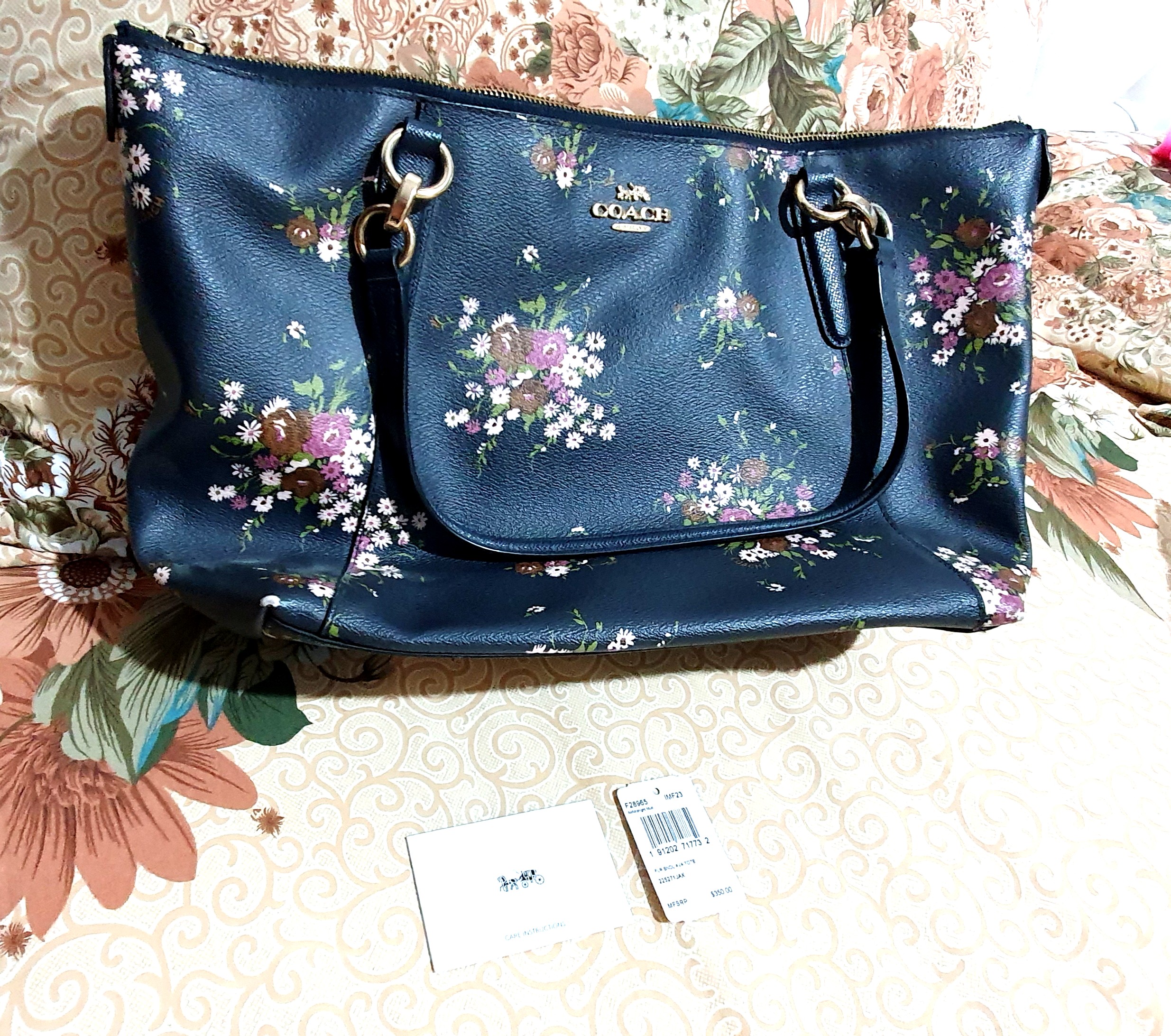 Coach black flower best sale purse