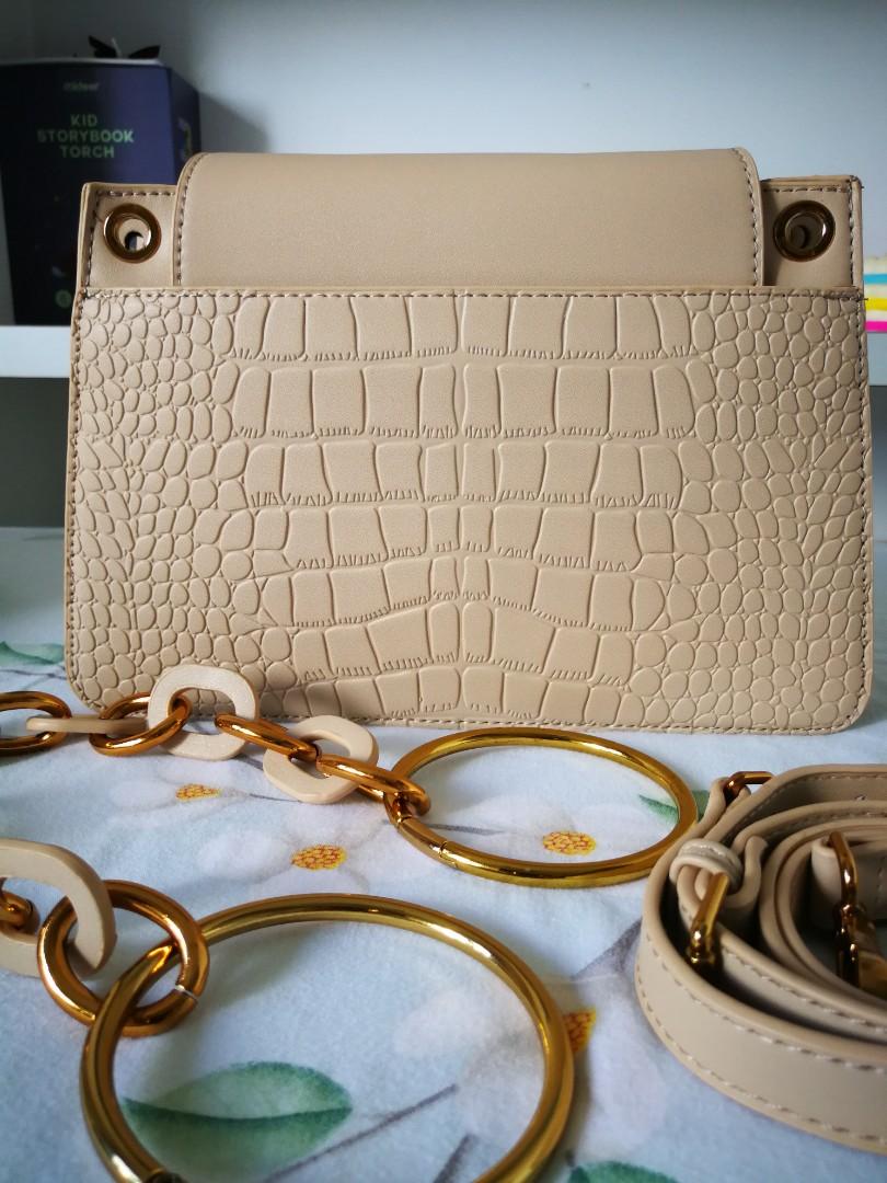 D C shoulder sling bag
