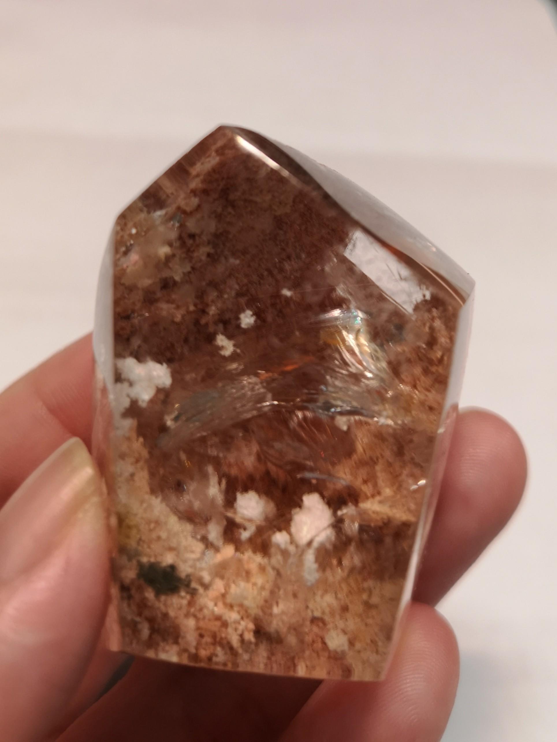 Fluorite and Phantom Pointers (Category: Precious Stones) located in Singapore. Submitted by sassysnake (Listing ID 1084335183, Image 5). Description: Photo 1 to 2 - H:11.5cm, B:2.9cm - $20 Photo 3 to 4 - H:11cm, B:3cm - $20 Photo 5 to 6- H: 5.35cm, B:4cm, Wt:96g - $45 Photo 7 to 8 - H:5.25cm, B:2.3cm, Wt:38.7g - $32 Second and fourth photo are close up of first and third photos. No cracks or nick. Benefits of fluorite: It absorbs and neutralises