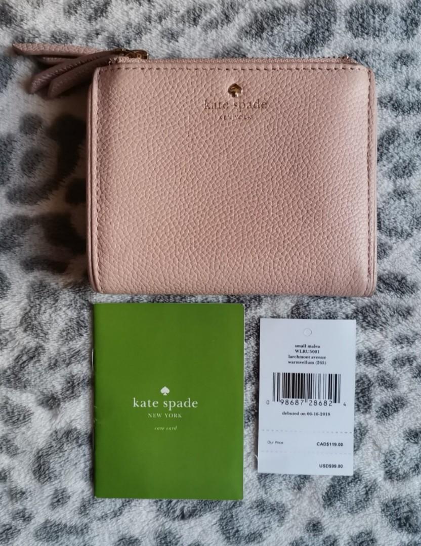 Kate Spade Malea wallet (Category: Wallets & Card holders) located in Paranaque City. Submitted by kgcbien (Listing ID 1086015614, Image 1). Description: with flaws.