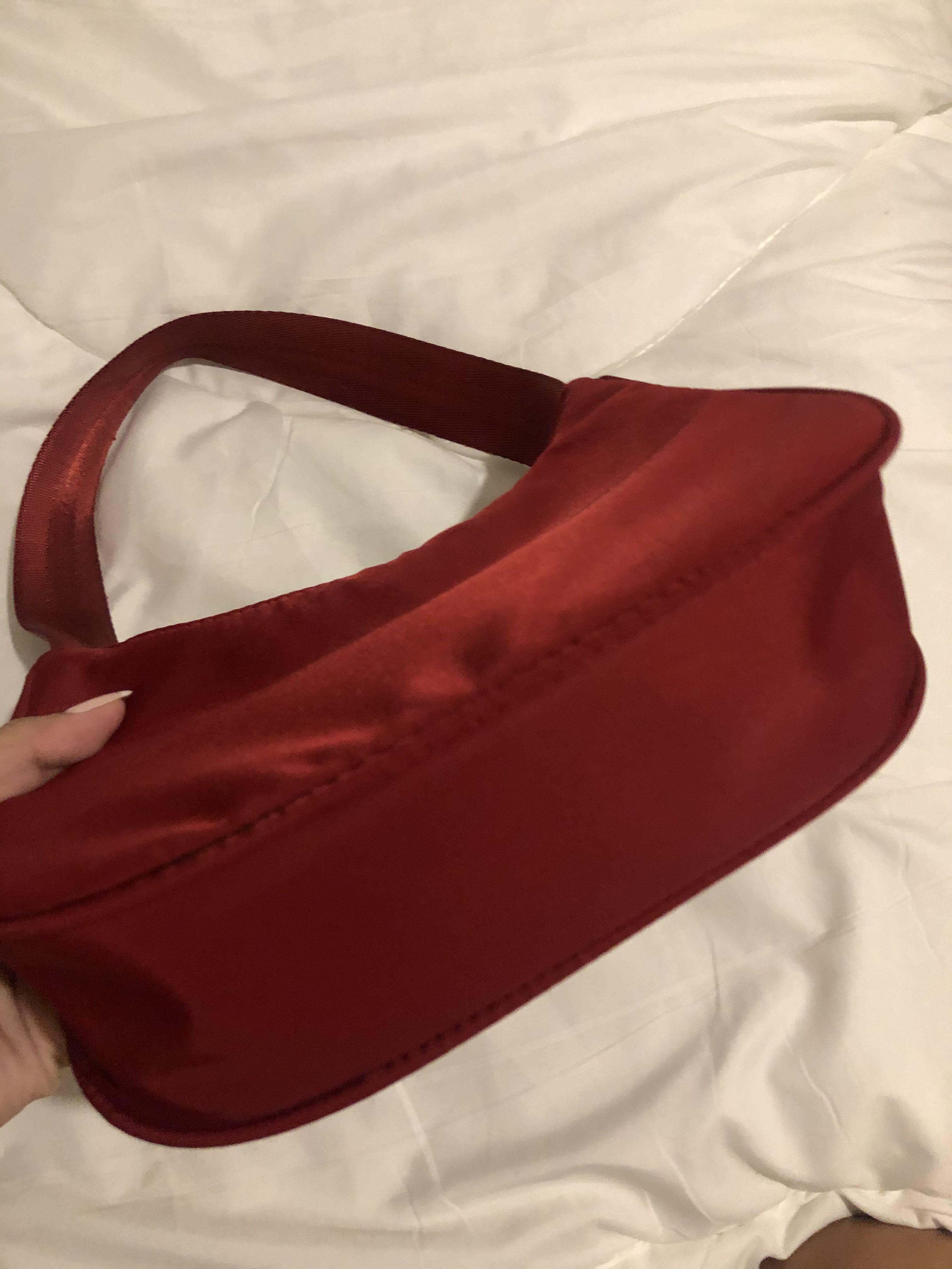 Prada mini hobo bag (Category: Shoulder Bags) located in Lapu-Lapu City. Submitted by miss.mei (Listing ID 1086064086, Image 3). Description: used for a bit and for a while only. still in good condition and hard to find kind of replica bag. inclusion with dust bag and authenticity card only.