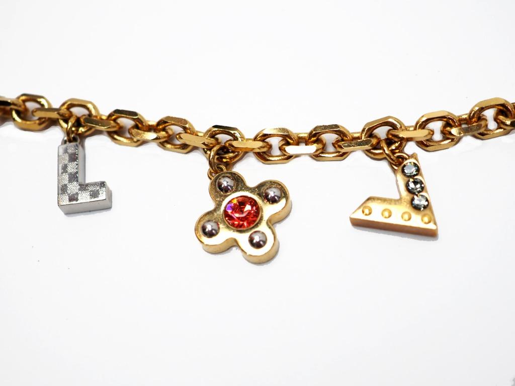 Pre-owned Louis Vuitton Crystal Love Letter Timeless Three Tone Charm  Bracelet In Silver