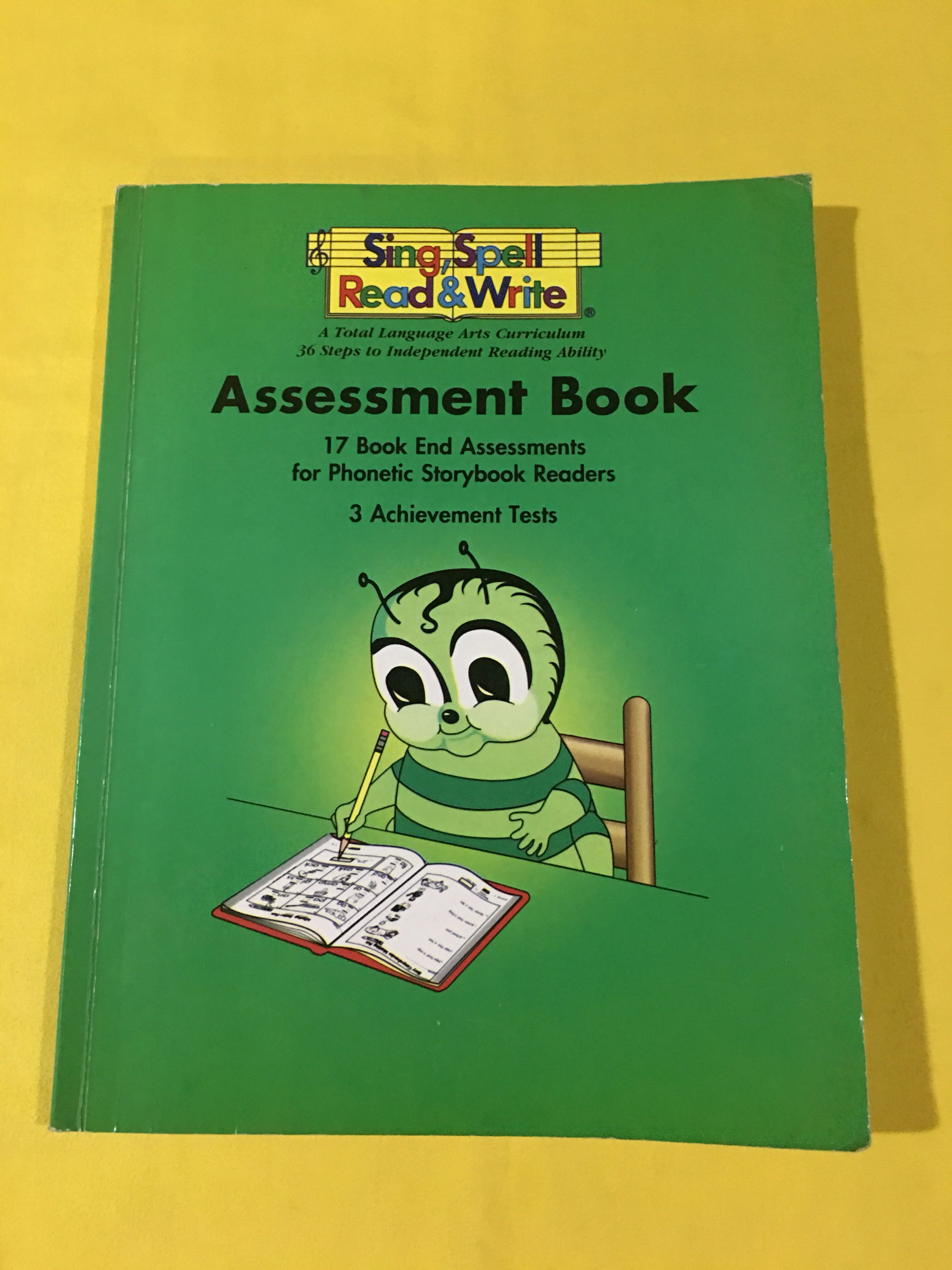 Sing Spell Read Write Assesment Book with markings for reference