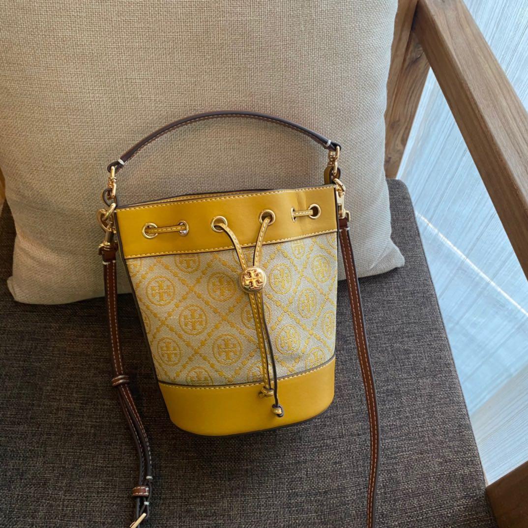 Small) Tory Burch T monogram Bucket bag yellow Small size, Women's Fashion,  Bags & Wallets, Purses & Pouches on Carousell