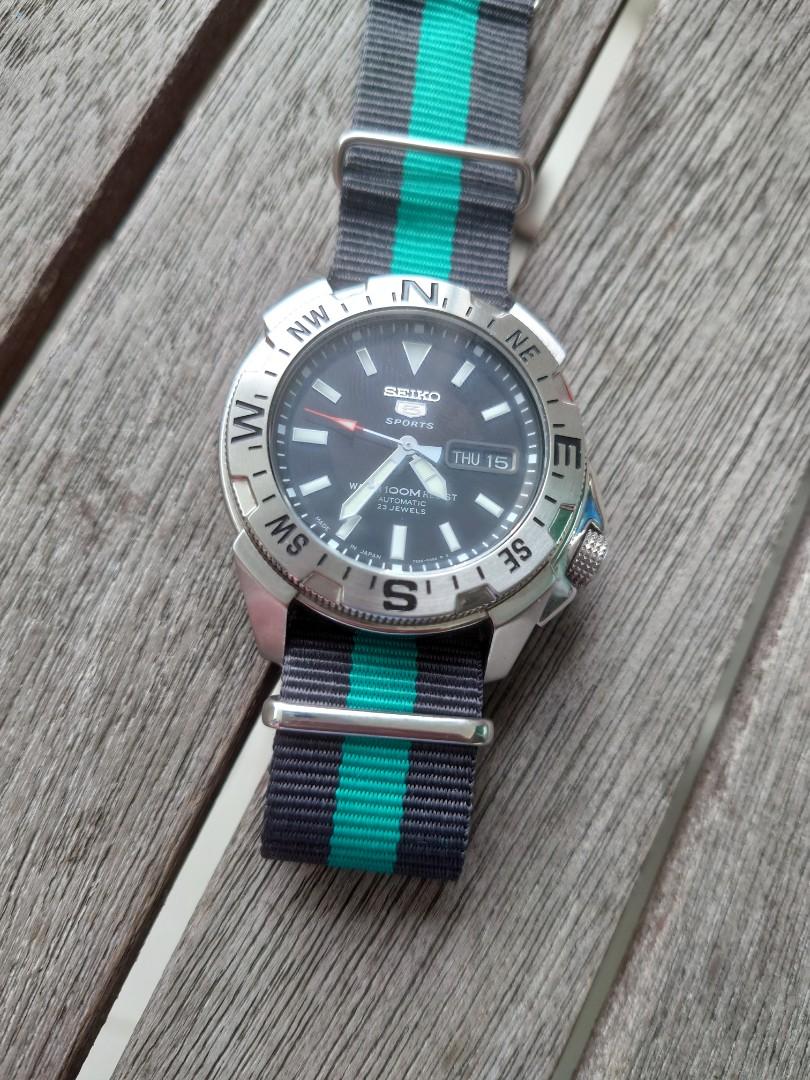 Cheap Seiko 5 sports Auto and compass bezel Mobile Phones