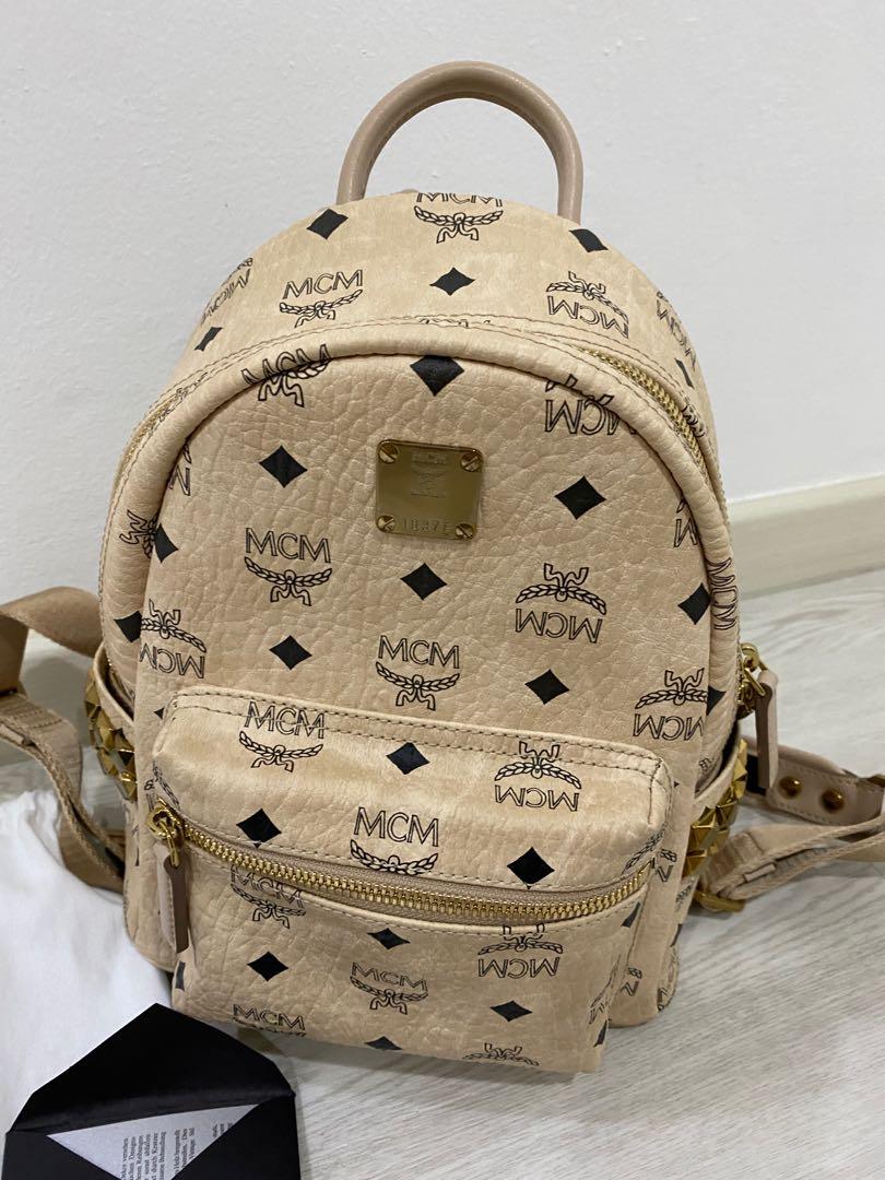 Mcm beige backpack best sale