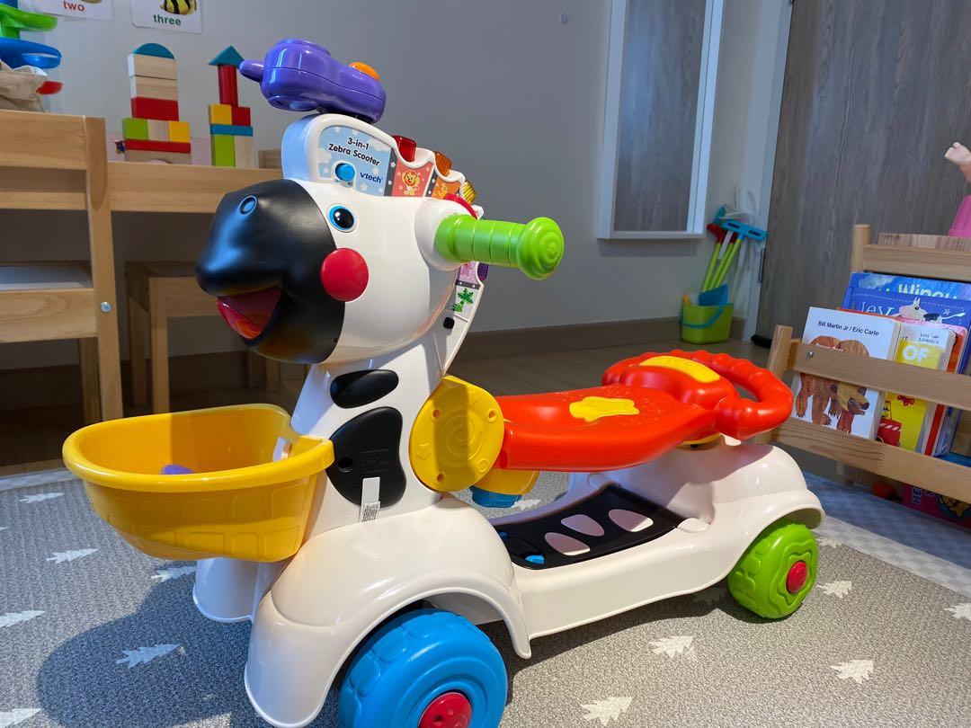 Fisher price zebra scooter online