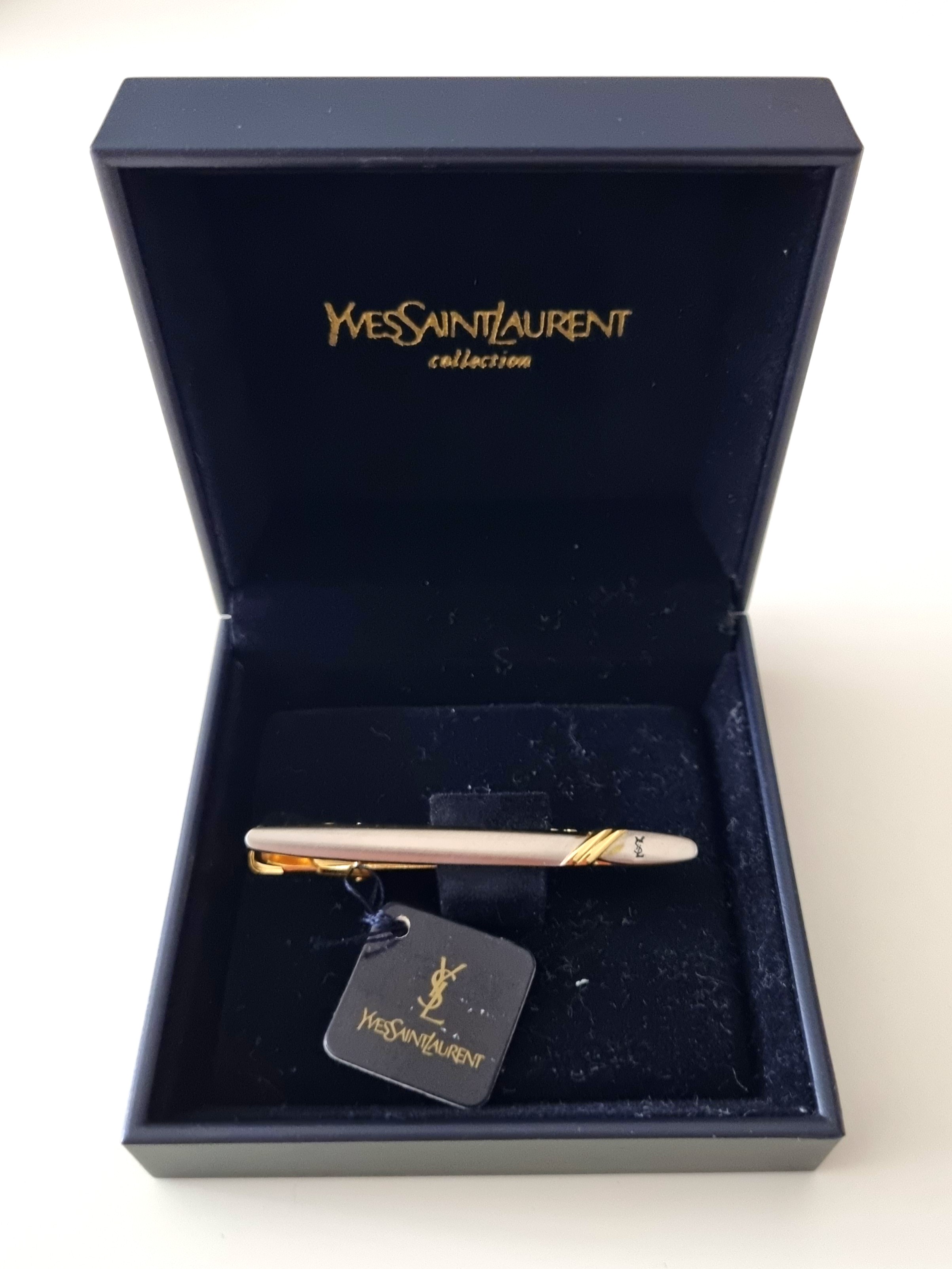 ysl tie bar