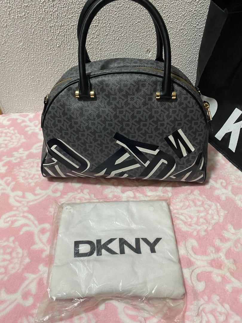 💯Authentic DKNY Bag and wallet (Category: Luxury Bags & Wallets) located in Manila. Submitted by saint_roch (Listing ID 1086530226, Image 2). Description: Shoulder and Hand bag. Used once. Almost new. Bought in Resort World My personal collection . Inclusion care card , pouch bag( white still sealed), cloth bag, and price tag..