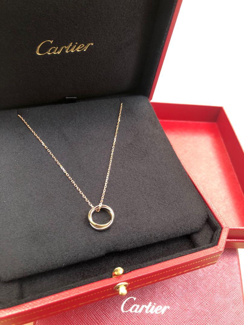 Cartier trinity deals necklace on neck