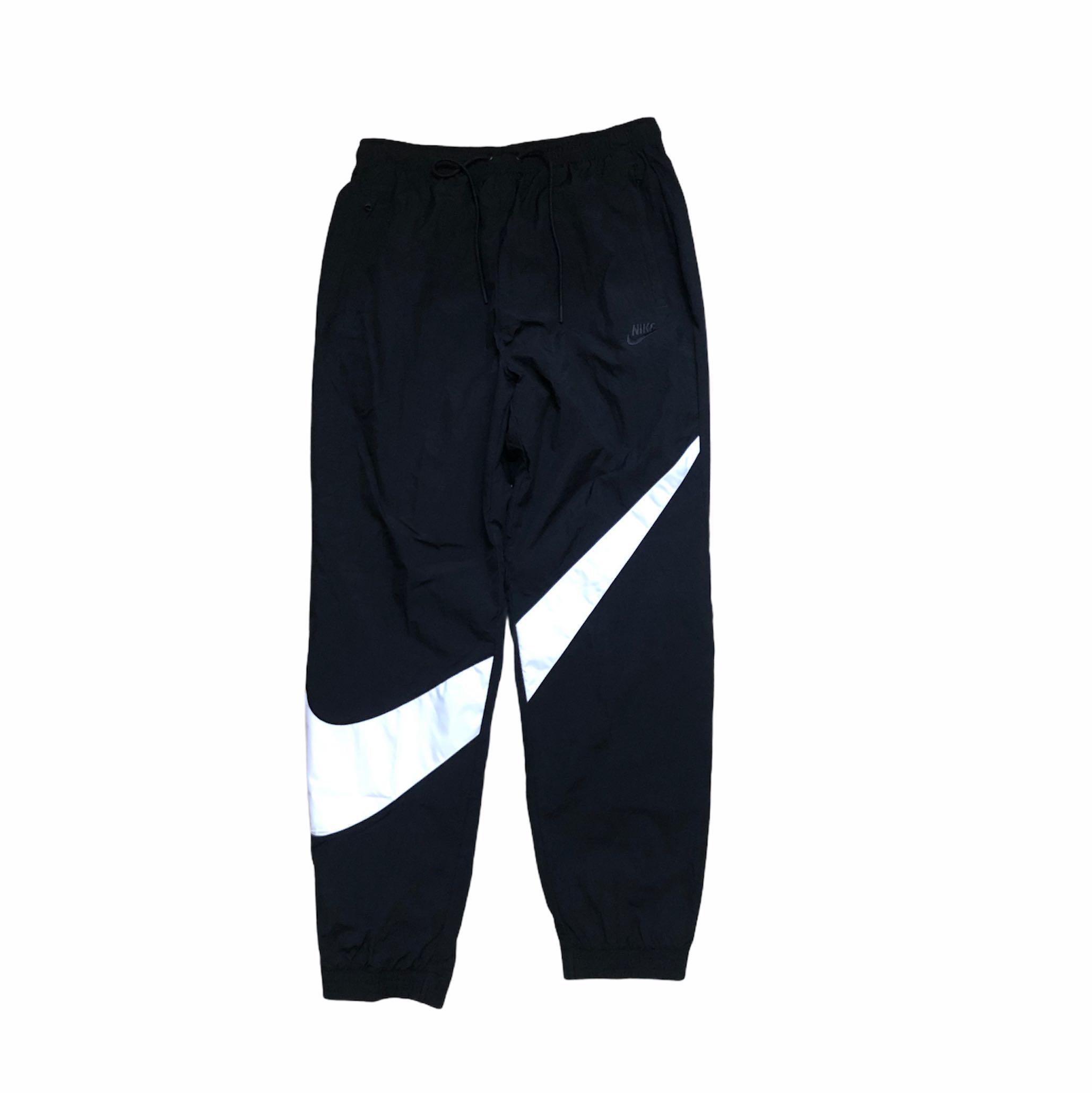 Nike swoosh tracksuit on sale bottoms