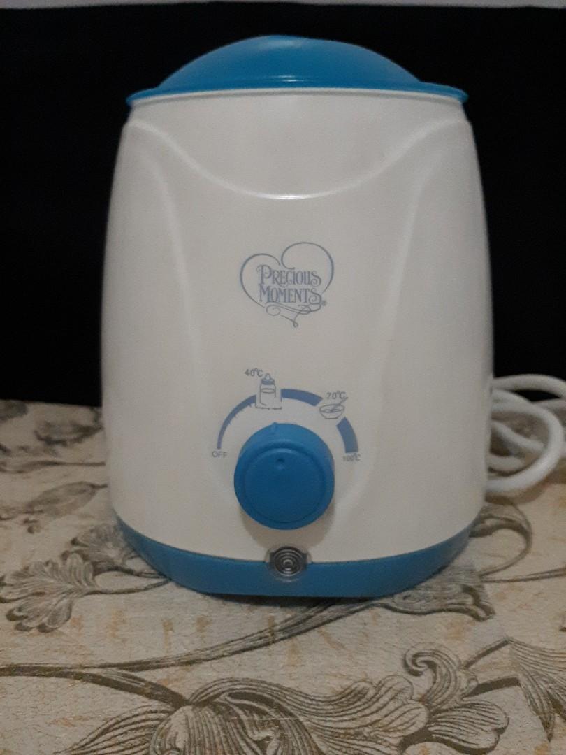 Pigeon brand Sterilizer with free precious moments bottle warmer