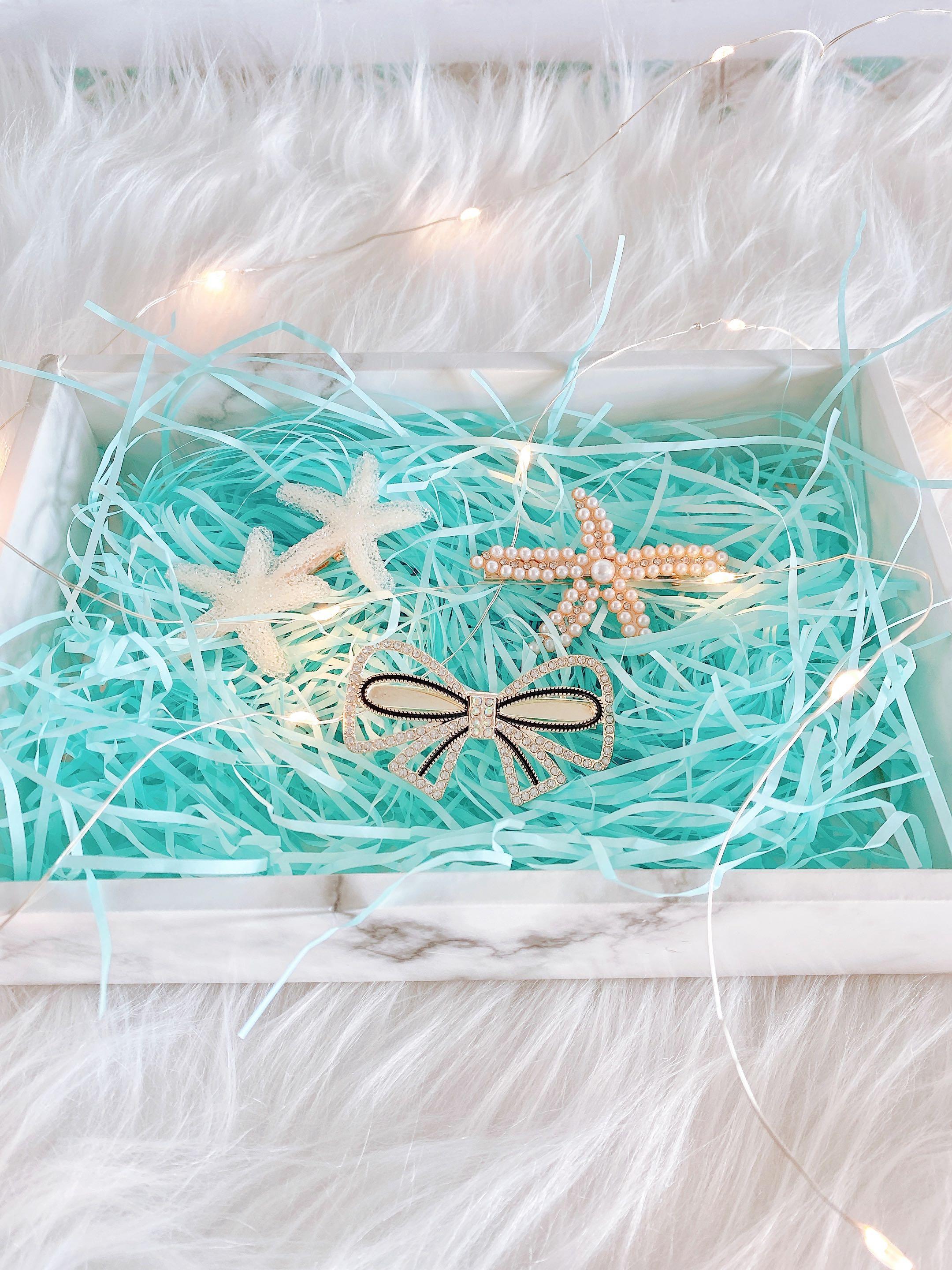 Shredded paper, confetti paper cushioning fill in baby blue for cake