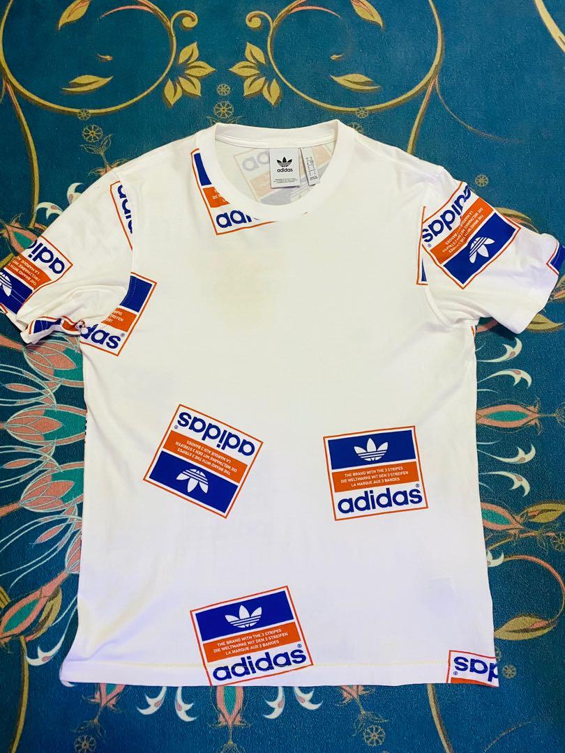 Adidas sticker outlet t shirt