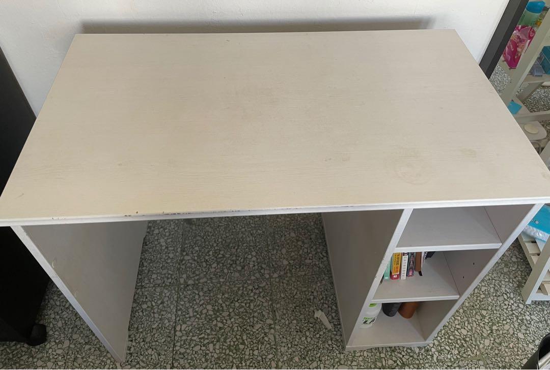 IKEA Study Table (Category: Tables & Sets) located in Singapore. Submitted by tiongbahrucat (Listing ID 1091306985, Image 3). Description: Easily dismantled and can fit into a taxi ❤️ Extension cord holder for cables. Convenient to use for laptop charger, phone chargers, etc ❤️ 3 large shelves to store items ❤️ Good condition with wear and tear as pictured ❤️ 90x70x52cm Pickup at anytime from Tiong Bahru Yong Tao Hu. Priced to clear urgently. U.P