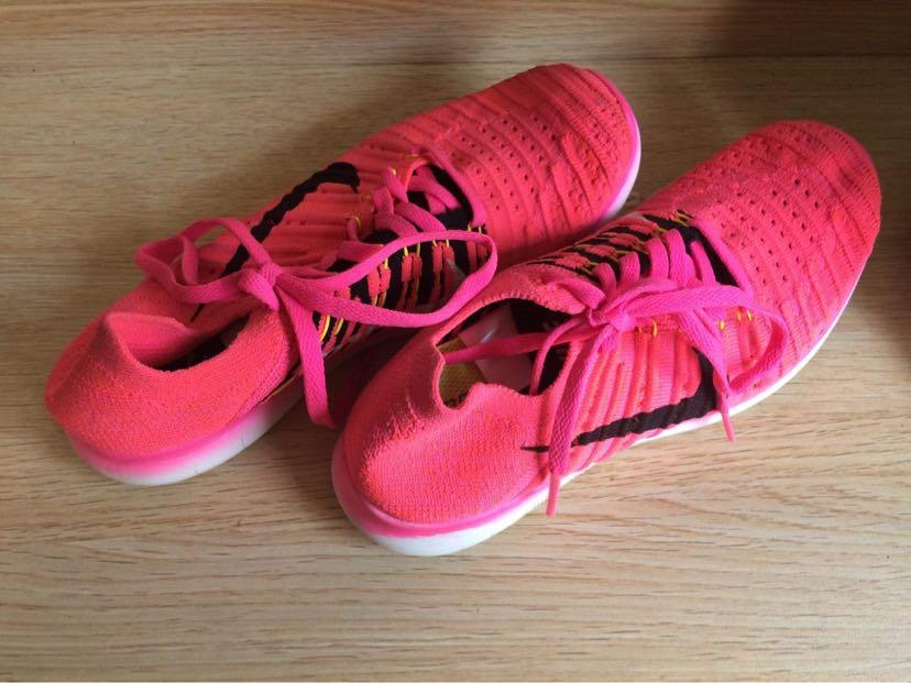 Free rn motion flyknit women's running shoe on sale