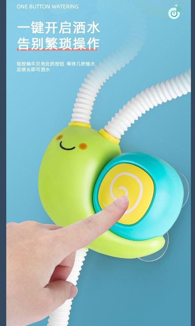 Snail Shower Bath Toy (Category: Bathtub & Bath Accessories) located in Quezon City. Submitted by tanyachoa (Listing ID 1093254671, Image 3). Description: 🎈Needs 3 pcs AA battery 🎈Colors: Green/Purple.