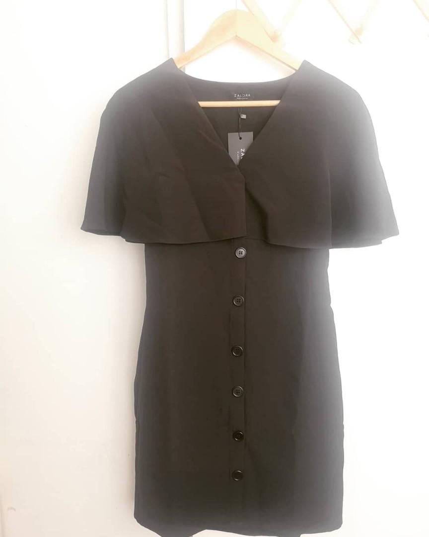 Zalora Black Cape Mini Dress (Category: Dresses) located in Imus. Submitted by petitstore.ph (Listing ID 1093280313, Image 1). Description: Zalora Collection Black Cape Mini Dress Size S, best fits petite frames Brand New with tag.