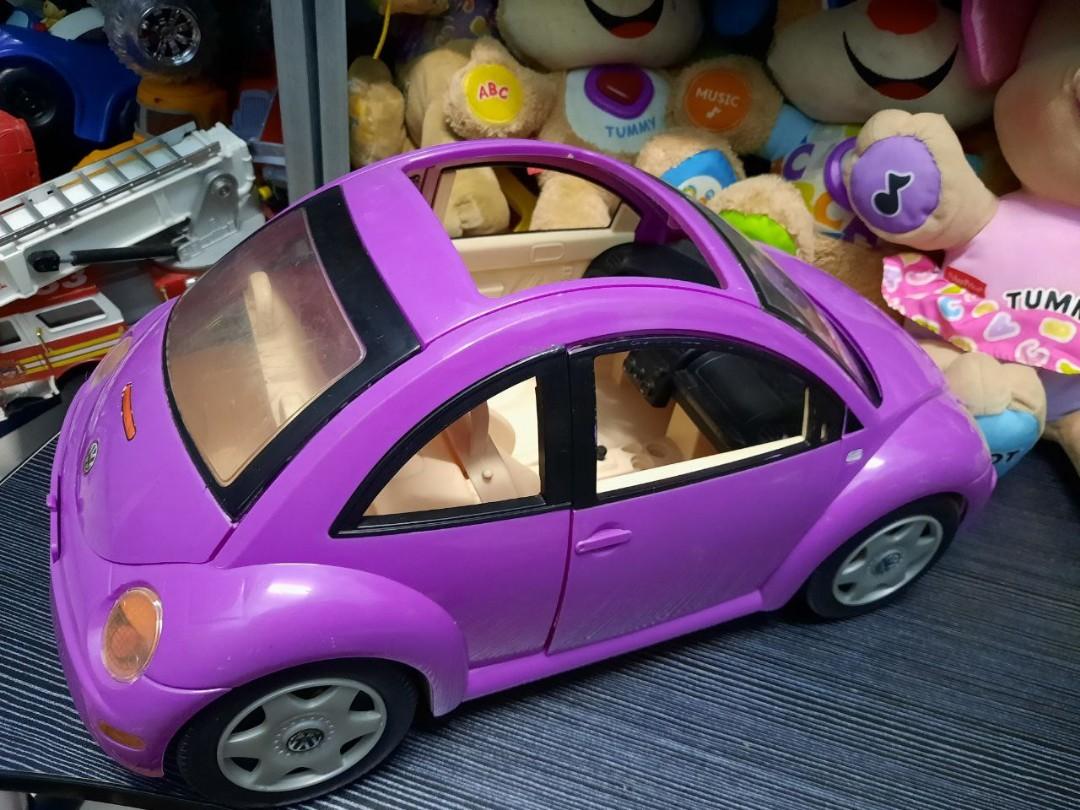 Barbie volkswagen beetle with 2 barbie Hobbies Toys