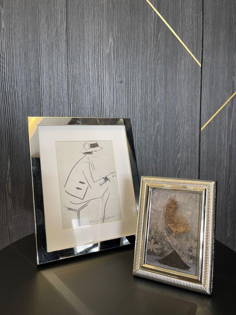Cool frames (Category: Frames & Pictures) located in Singapore. Submitted by daintypeony (Listing ID 1093531686, Image 1). Description: Silver frame set $50 High quality. 👍🍸 Velvet material backing. 3D Creative frame $30 Very innovative 😃👍.
