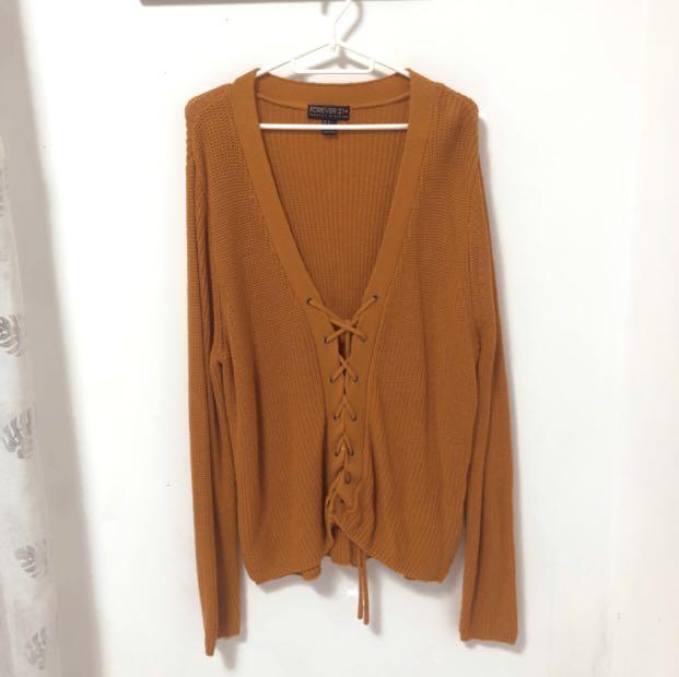 F21 Mustard cardigan like top (Category: Longsleeves) located in Quezon City. Submitted by pieces.ph (Listing ID 1093650678, Image 1). Description: - used two times only, see pic for damage (it was like that when i bought it, didn't notice) - small hole is unnoticeable when you're wearing it - very classy n cute - price is negotiable .