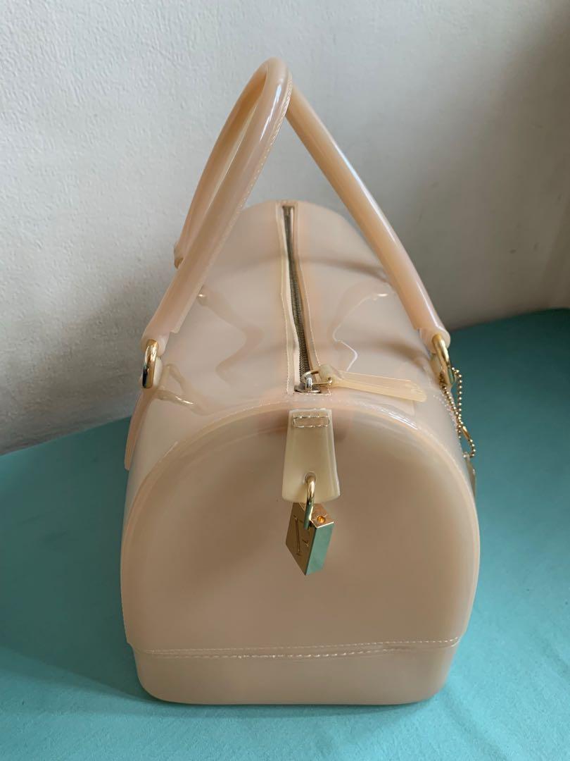 Furla Nude Candy Bag (Category: Luxury Bags & Wallets) located in Makati City. Submitted by paraisodeclutters (Listing ID 1093597472, Image 2). Description: Guaranteed authentic. In excellent used condition. Comes with lock, tag and provided dust bag (can’t find original dust bag anymore). Very pretty in actual! .