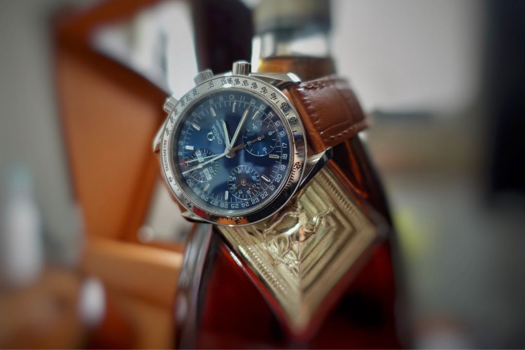 Omega speedmaster triple hotsell date blue dial
