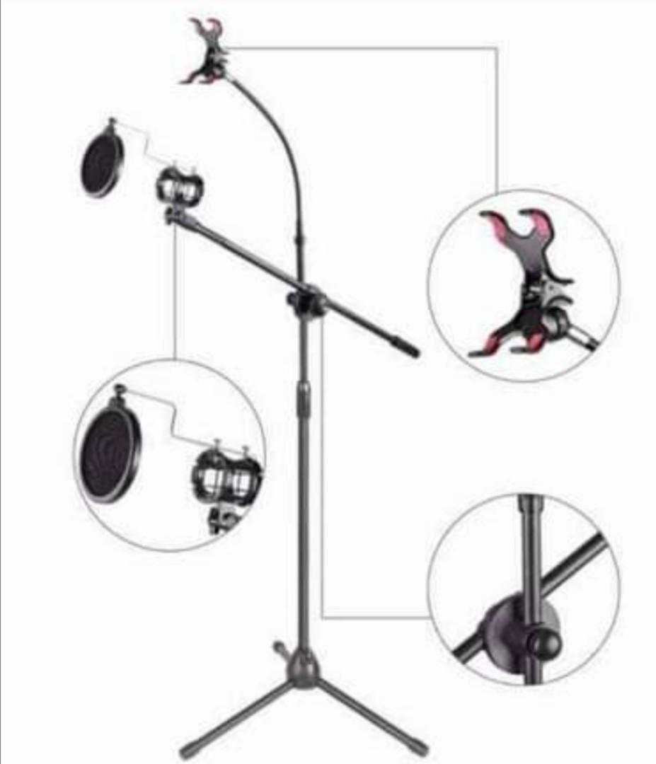 Phone holder and microphone stand (Category: Early Generation Mobile Phones) located in San Juan City. Submitted by dollmac (Listing ID 1093468179, Image 2). Description: Actual photo On my post picture High quality Metal material.