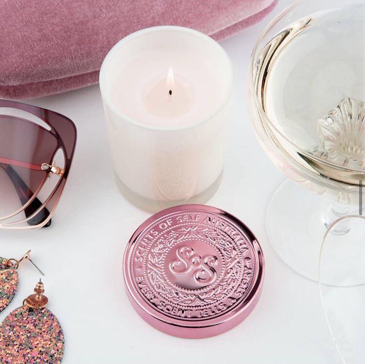 SCENTS OF SELF AUSTRALIA - PROSECCO ROSE SOY CANDLE | LIMITED EDITION 80G (Category: Fragrance) located in Sydney. Submitted by sydneyfashionbabe (Listing ID 1093611576, Image 2). Description: SCENTS OF SELF AUSTRALIA - PROSECCO ROSE SOY CANDLE | LIMITED EDITION 80G This exquisitely fragranced natural soy blend candle infuses any room with its engaging aroma that lasts for hours. The embossed pink metal lid doubles as a protective coaster for fur