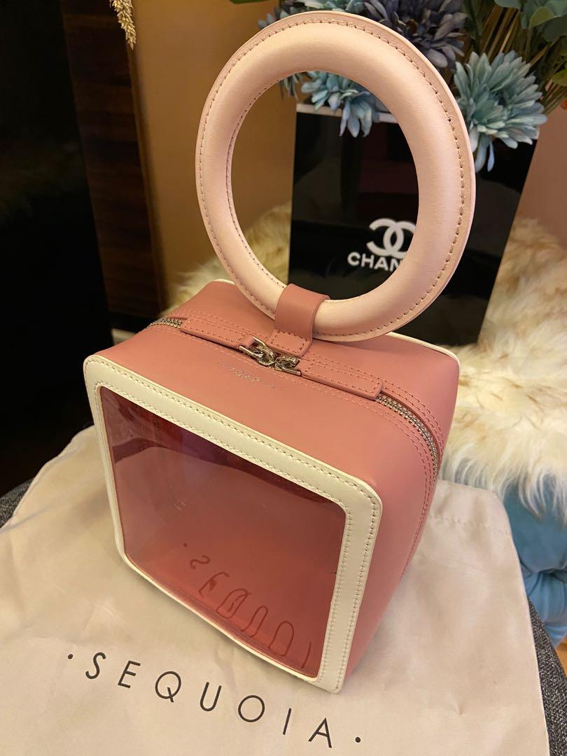 Sequoia Crystal Cube Bag- Brand new (Category: Luxury Bags & Wallets) located in Quezon City. Submitted by betty.beth (Listing ID 1093555061, Image 2). Description: Sequoia Crystal Cube Bag in Pink- Brand new Limited Collection Sequoia Cube box Comes with dust bag and paper bag 100% authentic! Available color: Blue and Pink A modern rendition of Sequoia’s signature cube bag featuring a transparent face with white borders. Size : 16x16x10cm (Lengt