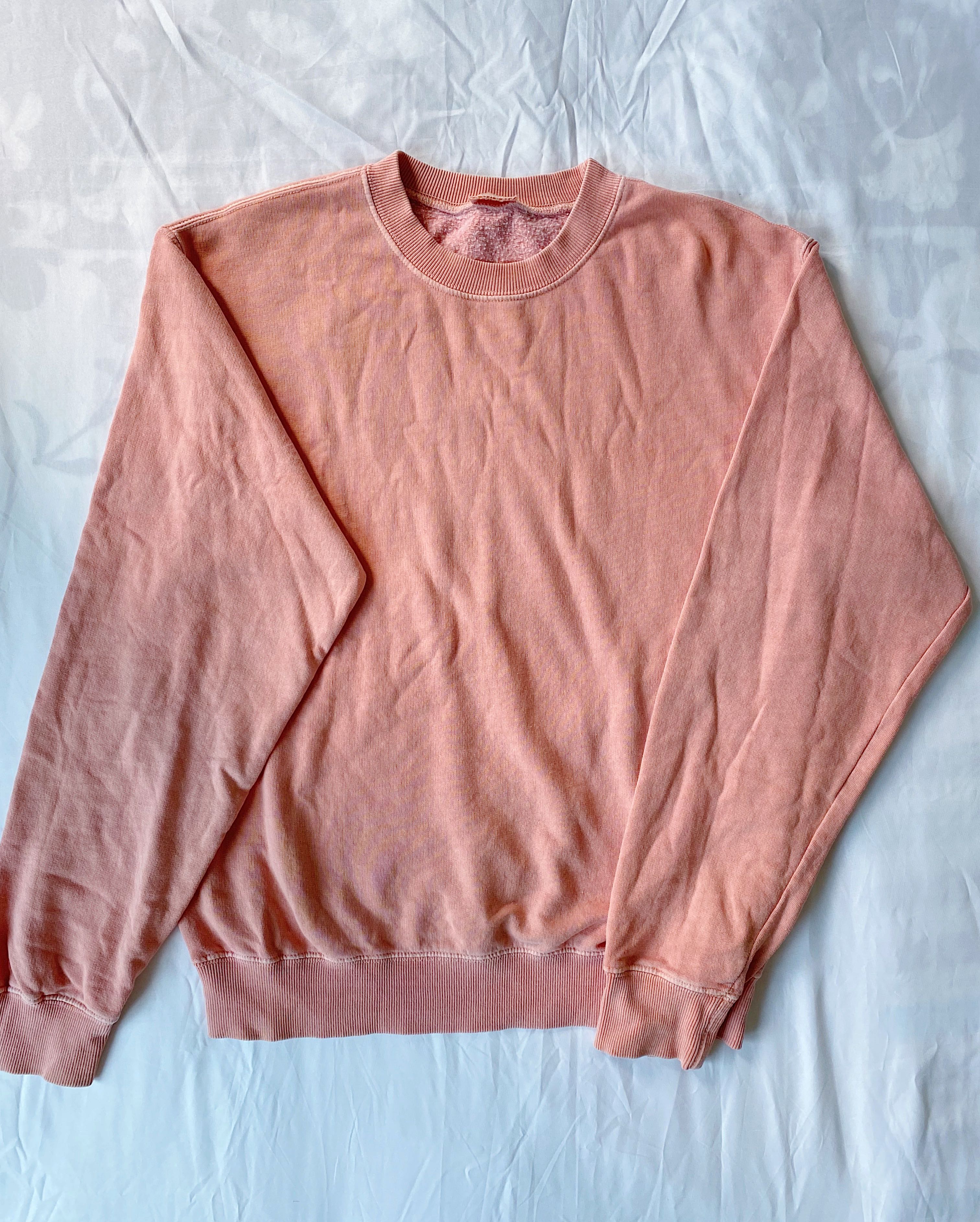 salmon pink sweatshirt