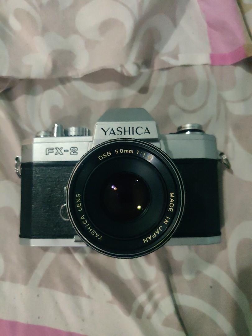 Yashica FX-2 (Category: Cameras) located in Manila. Submitted by conniev (Listing ID 1093624043, Image 1). Description: Yashica FX-2 with Yashica 50mm 1.9 lens. I don't know if it is working. I bought it 2nd hand for P2,500.00 for props for a pictorial shoot..